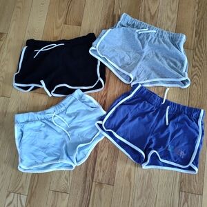 Set of Four Dolphin Shorts in Black, Gray, Light Blue, and Blue